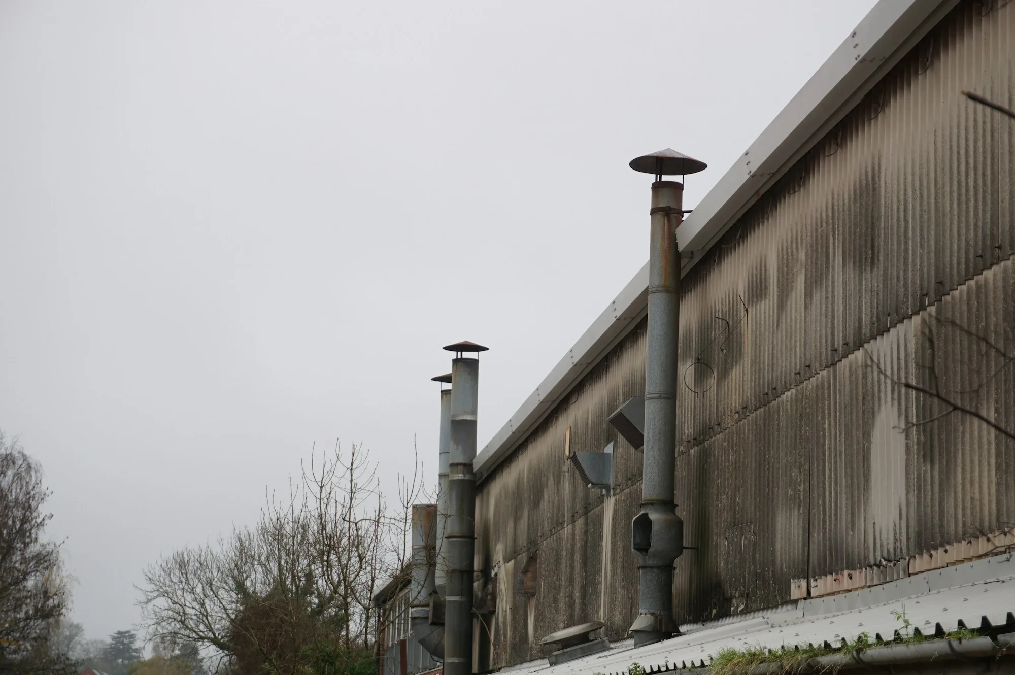 Pipework and chimneys on a UK industrial building