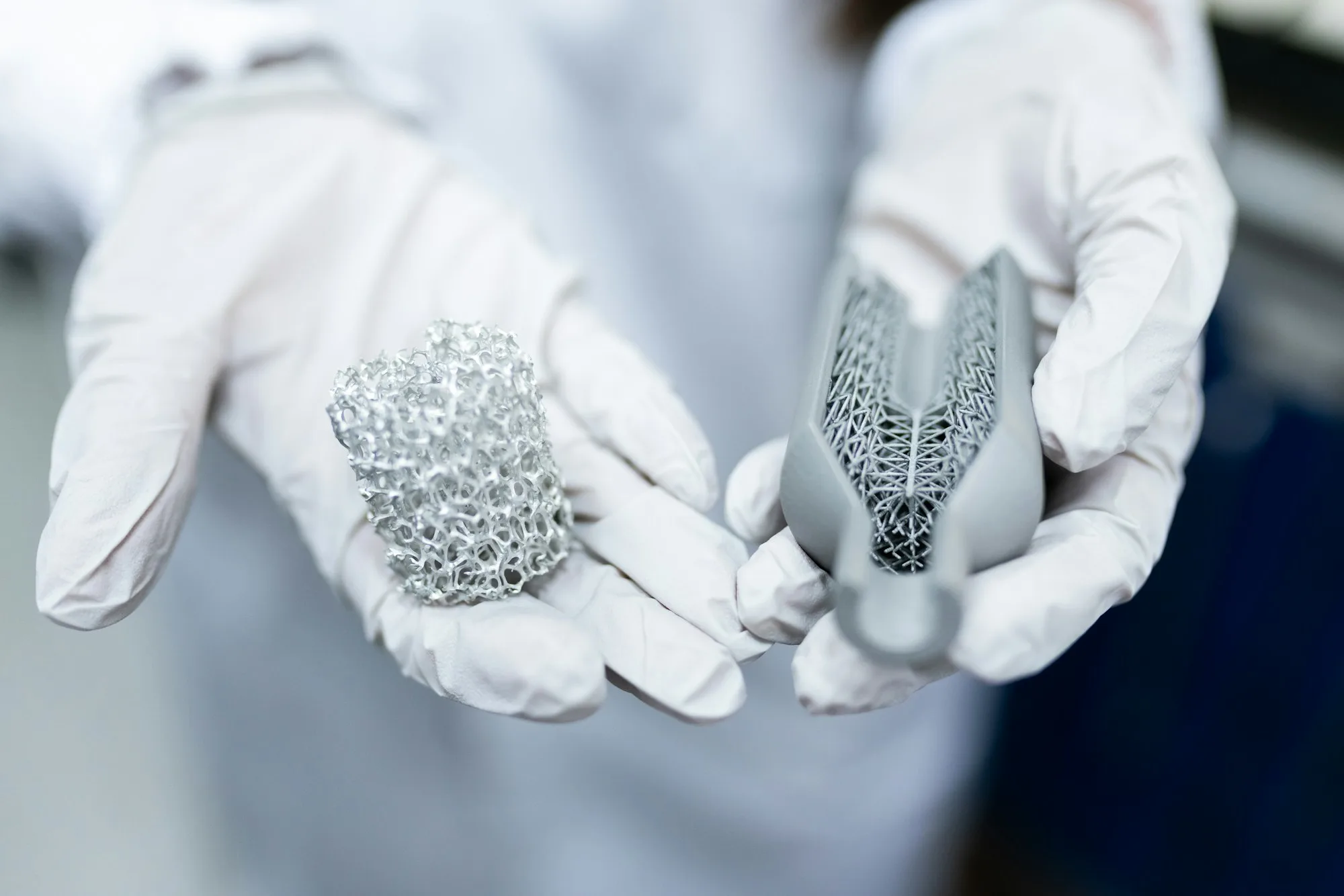 Two engineered material samples held for comparison