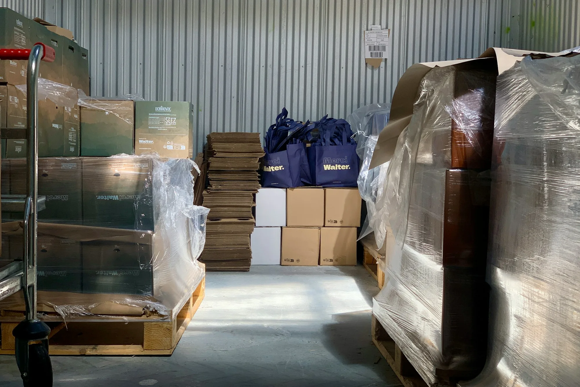 Boxes and goods stored inside a London warehouse