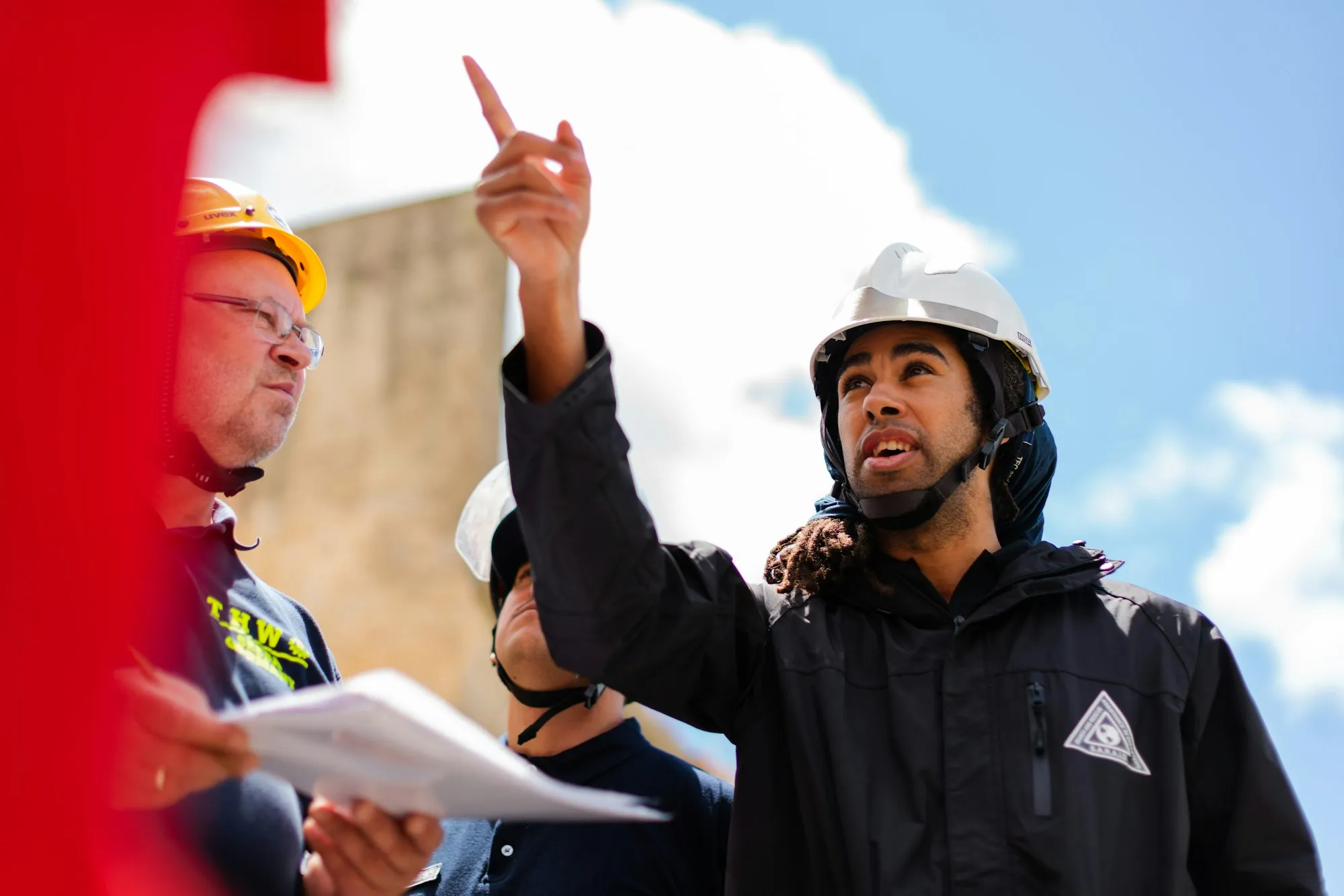 An engineer leading a technical site discussion