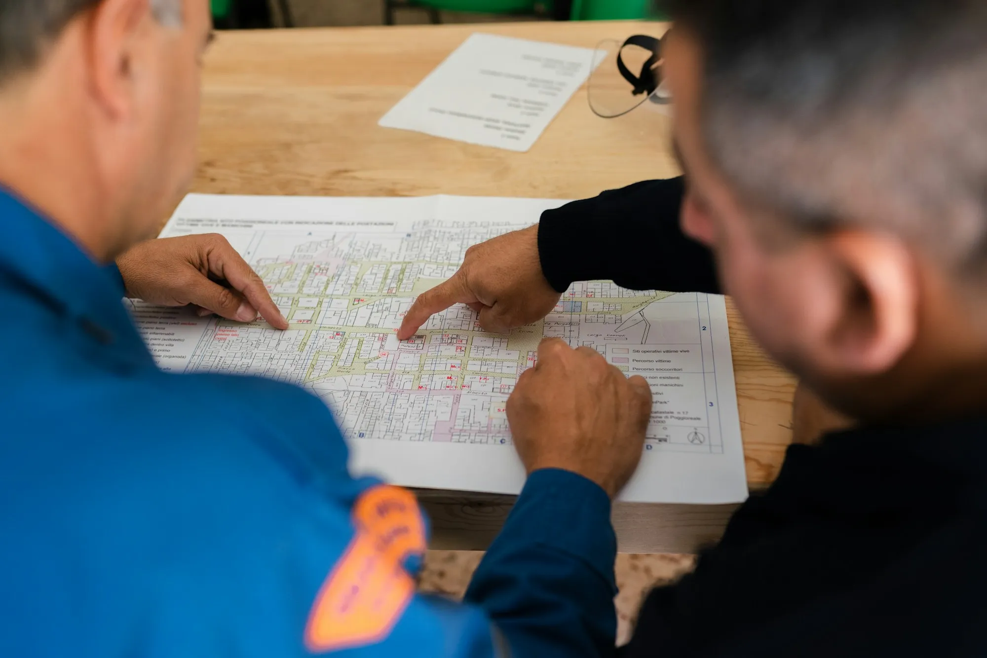 Engineers reviewing a technical map together